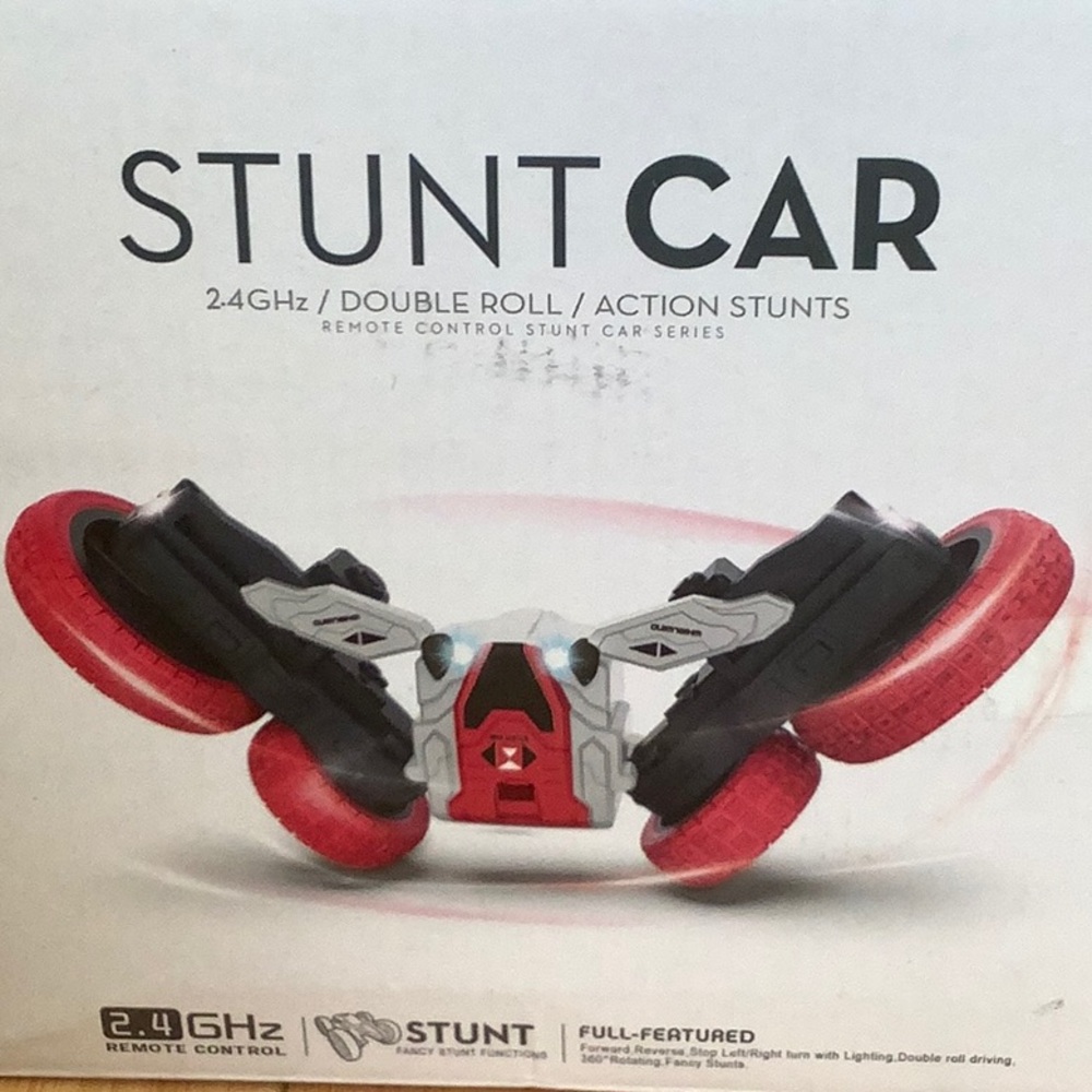 A remote control stunt car with a 2.4GHz remote control.